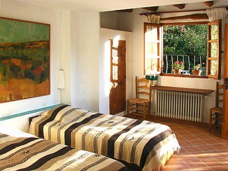 Photo of a triple bedroom of casa rural