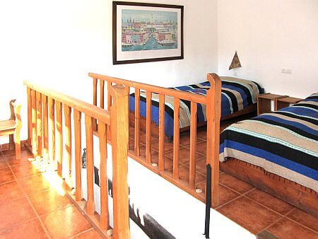 Photo of a twin bedroom of casa rural